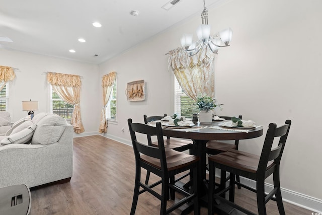 1428 Lanterns Rest Rd Unit 1428, Myrtle Beach, SC 29579 - dining room with a chandelier, recessed lighting, wood finished floors, and ornamental molding