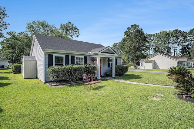 6570 Pebble Beach Cres, Myrtle Beach, SC 29588 - view of front of house with a front yard and a shingled roof