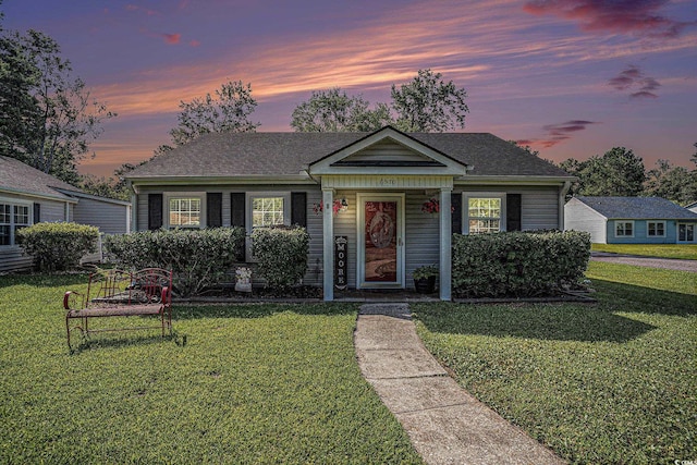 6570 Pebble Beach Cres, Myrtle Beach, SC 29588 - view of front of home featuring a lawn and roof with shingles