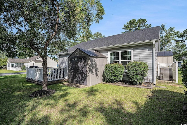 6570 Pebble Beach Cres, Myrtle Beach, SC 29588 - back of house with a storage shed, a lawn, and a wooden deck