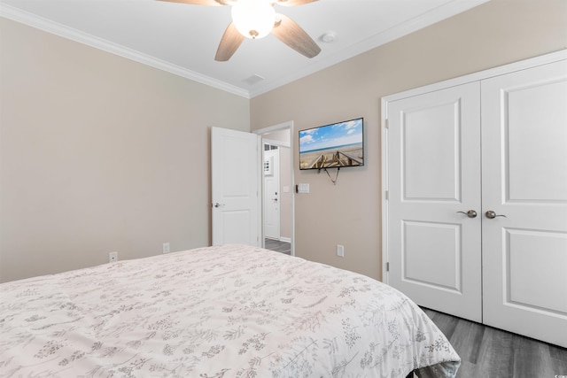 3647 Diamond Stars Way, Little River, SC 29566 - bedroom featuring ornamental molding, dark wood finished floors, a closet, and ceiling fan
