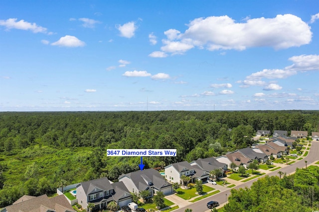 3647 Diamond Stars Way, Little River, SC 29566 - aerial view of residential area with a heavily wooded area