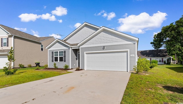 1128 Sennema Cir, Myrtle Beach, SC 29588 - view of front of home with concrete driveway, a garage, and a front yard