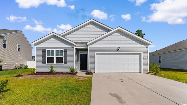 1128 Sennema Cir, Myrtle Beach, SC 29588 - view of front facade featuring an attached garage, a front lawn, and driveway