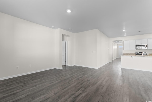 1128 Sennema Cir, Myrtle Beach, SC 29588 - unfurnished living room featuring dark wood finished floors and recessed lighting