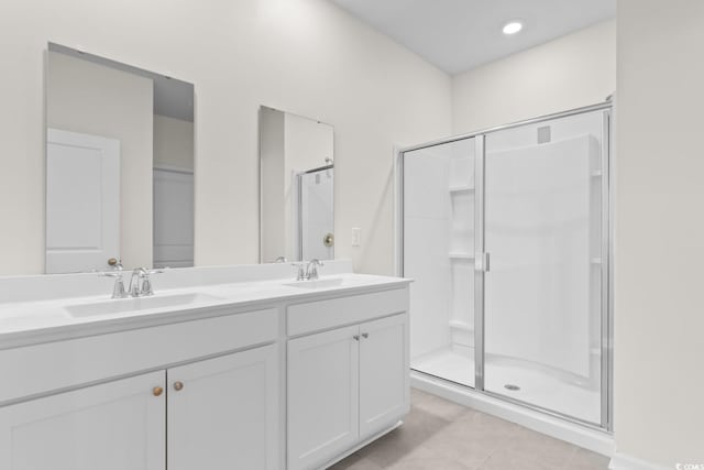 1128 Sennema Cir, Myrtle Beach, SC 29588 - bathroom with double vanity, a shower stall, and tile patterned floors