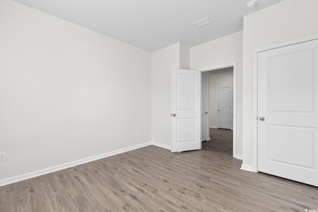1128 Sennema Cir, Myrtle Beach, SC 29588 - unfurnished bedroom with light wood-type flooring