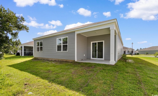1128 Sennema Cir, Myrtle Beach, SC 29588 - back of property featuring a patio and a yard