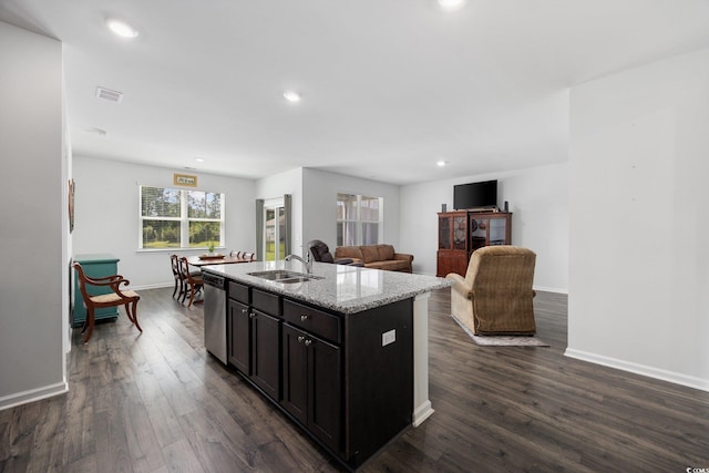 305 Forestbrook Cove Cir, Myrtle Beach, SC 29588 - kitchen featuring dishwasher, dark wood finished floors, light stone countertops, recessed lighting, and a center island with sink
