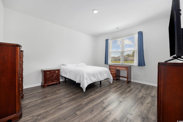 305 Forestbrook Cove Cir, Myrtle Beach, SC 29588 - bedroom featuring dark wood-style flooring and baseboards