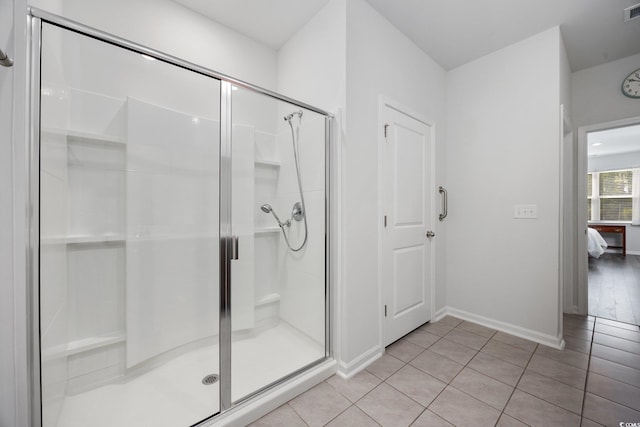 305 Forestbrook Cove Cir, Myrtle Beach, SC 29588 - ensuite bathroom featuring a stall shower and tile patterned flooring