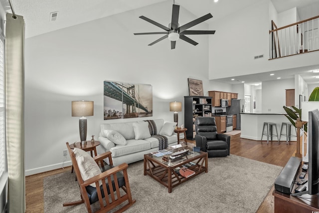 310 Lockerbie Ct Unit 1057, Myrtle Beach, SC 29577 - living area with wood finished floors, ceiling fan, and high vaulted ceiling