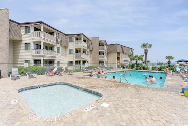 5601 N Ocean Blvd Unit E-113, Myrtle Beach, SC 29577 - community pool featuring a patio area