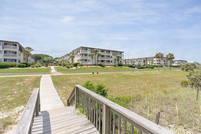 5601 N Ocean Blvd Unit E-113, Myrtle Beach, SC 29577 - surrounding community featuring a yard and a residential view