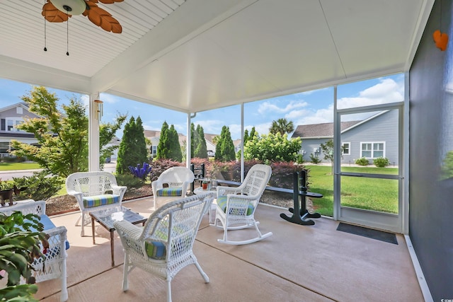 932 Abernathy Pl, Surfside Beach, SC 29575 - sunroom / solarium featuring floor to ceiling windows and a ceiling fan