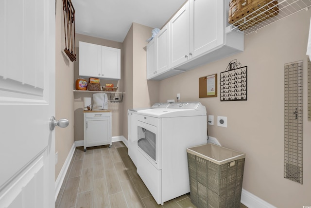 932 Abernathy Pl, Surfside Beach, SC 29575 - laundry area with cabinet space and washing machine and clothes dryer