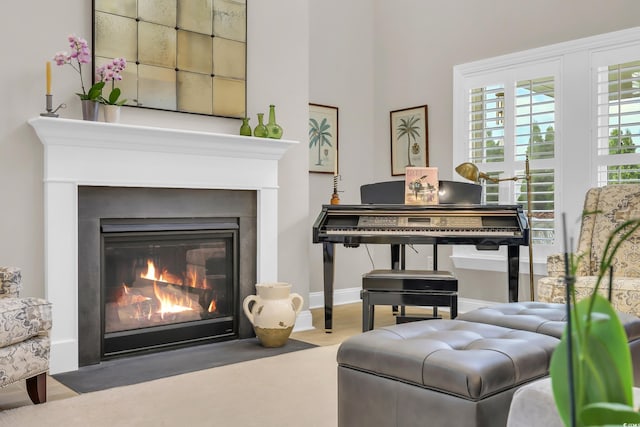 932 Abernathy Pl, Surfside Beach, SC 29575 - sitting room featuring a fireplace with flush hearth and wood finished floors