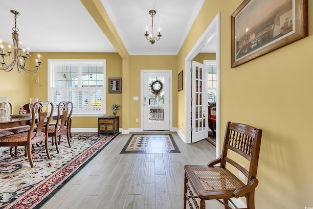 932 Abernathy Pl, Surfside Beach, SC 29575 - foyer with a chandelier and wood finished floors