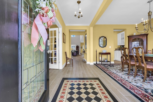 932 Abernathy Pl, Surfside Beach, SC 29575 - entryway with a chandelier and baseboards