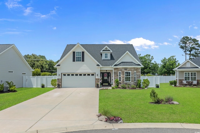 752 Hobonny Loop, Longs, SC 29568 - view of front of home with stone siding, driveway, an attached garage, and roof with shingles