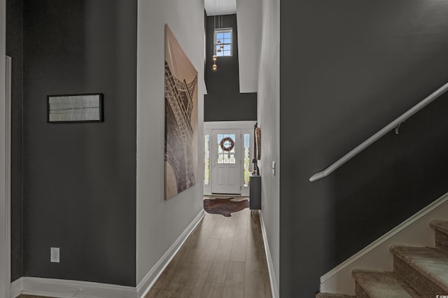 752 Hobonny Loop, Longs, SC 29568 - hall with wood finished floors, plenty of natural light, stairs, and a towering ceiling