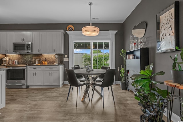 752 Hobonny Loop, Longs, SC 29568 - dining area with light wood finished floors