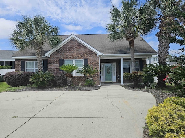 1028 Cherry Tree Ln, North Myrtle Beach, SC 29582 - ranch-style house featuring brick siding and a shingled roof