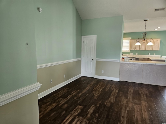 1028 Cherry Tree Ln, North Myrtle Beach, SC 29582 - unfurnished living room featuring dark wood finished floors and baseboards