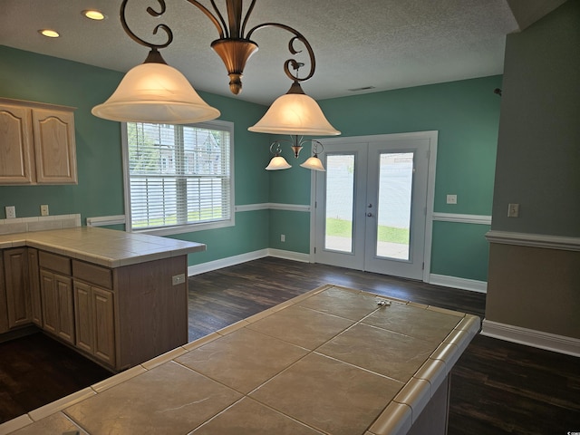 1028 Cherry Tree Ln, North Myrtle Beach, SC 29582 - kitchen with tile countertops, dark wood-type flooring, french doors, a textured ceiling, and recessed lighting