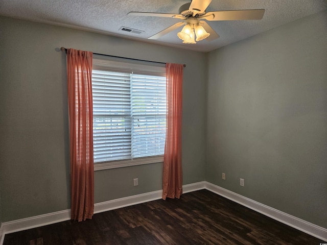 1028 Cherry Tree Ln, North Myrtle Beach, SC 29582 - empty room featuring dark wood finished floors, ceiling fan, and a textured ceiling