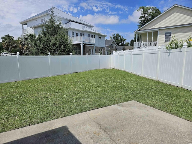 1028 Cherry Tree Ln, North Myrtle Beach, SC 29582 - fenced backyard featuring a patio area