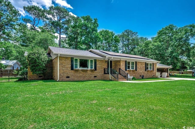 4189 Schoolhouse Cir, Little River, SC 29566 - ranch-style house with crawl space, concrete driveway, an attached carport, and brick siding