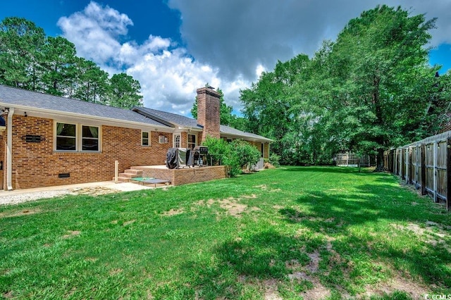 4189 Schoolhouse Cir, Little River, SC 29566 - fenced backyard with a patio