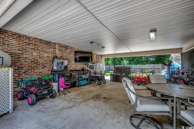 4189 Schoolhouse Cir, Little River, SC 29566 - fenced backyard with a patio and outdoor dining area
