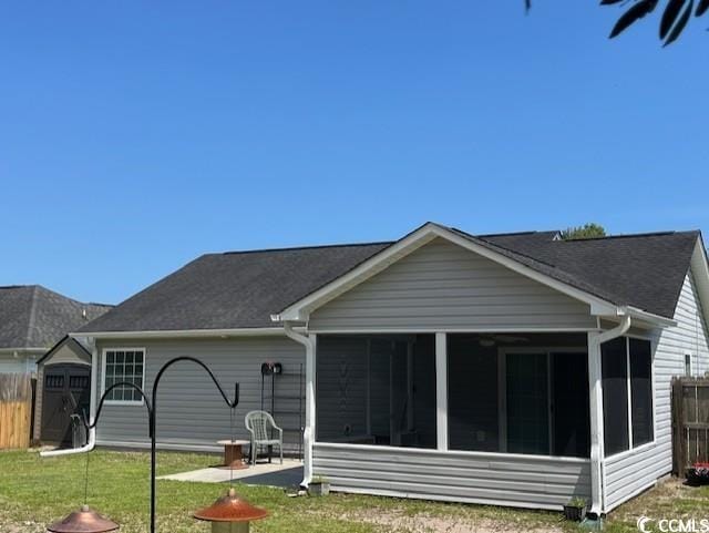 298 Weyburn St, Myrtle Beach, SC 29579 - rear view of property featuring a sunroom and a patio
