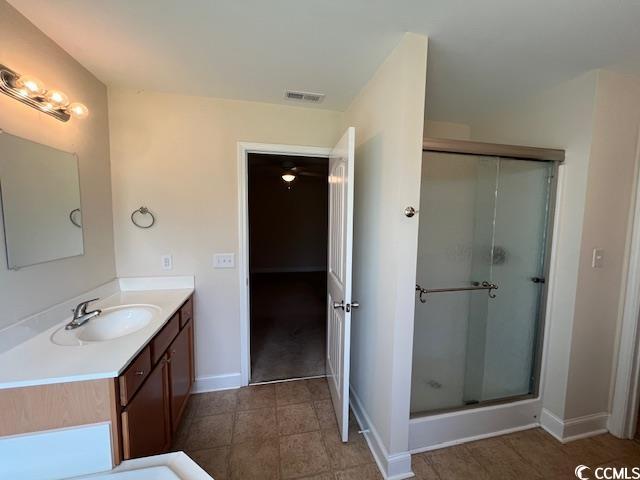 298 Weyburn St, Myrtle Beach, SC 29579 - bathroom with vanity and a stall shower