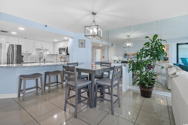 5511 N Ocean Blvd Unit 1801, Myrtle Beach, SC 29577 - dining area with a chandelier and recessed lighting