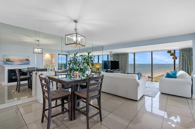 5511 N Ocean Blvd Unit 1801, Myrtle Beach, SC 29577 - dining room with a chandelier and light tile patterned floors