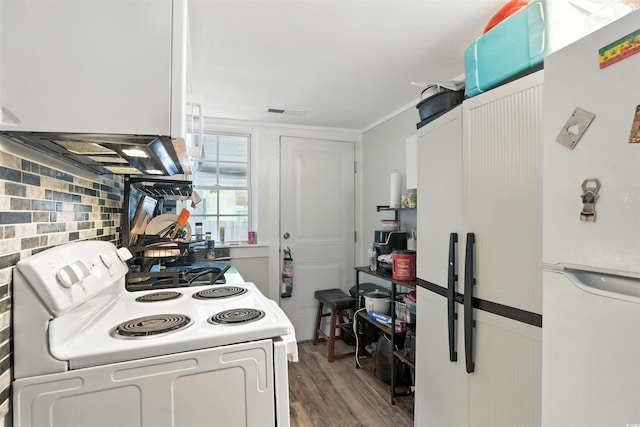 304 1st Ave N, Myrtle Beach, SC 29577 - kitchen featuring white appliances, decorative backsplash, and wood finished floors
