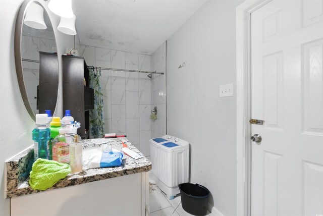 304 1st Ave N, Myrtle Beach, SC 29577 - full bath with vanity, a shower, and tile patterned flooring