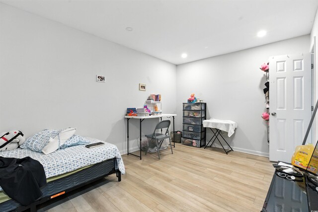 304 1st Ave N, Myrtle Beach, SC 29577 - bedroom with light wood-style floors and recessed lighting