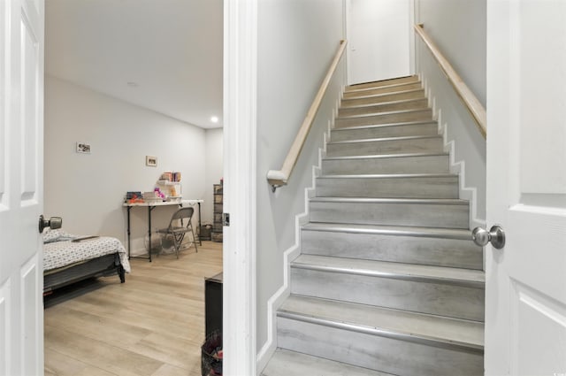 304 1st Ave N, Myrtle Beach, SC 29577 - stairway with wood finished floors and recessed lighting