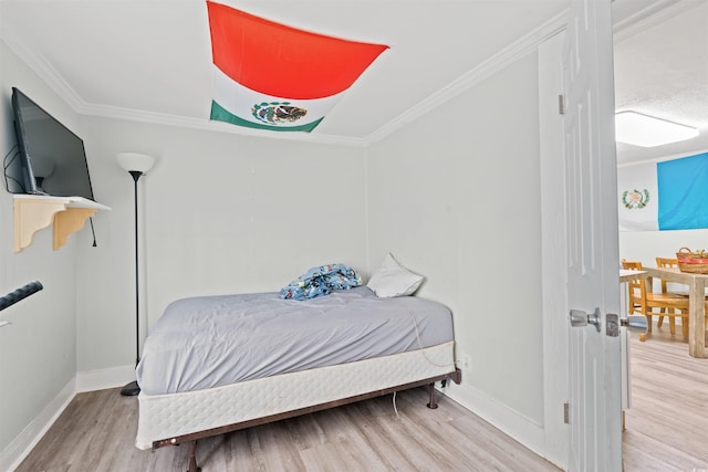 304 1st Ave N, Myrtle Beach, SC 29577 - bedroom featuring wood finished floors and crown molding