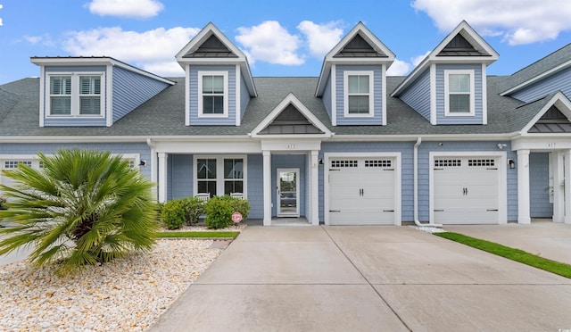 413 Goldenrod Cir Unit 2B, Little River, SC 29566 - view of front of property featuring concrete driveway and a shingled roof