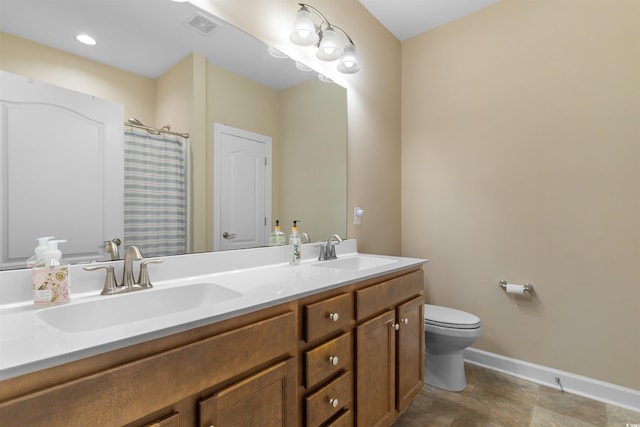 413 Goldenrod Cir Unit 2B, Little River, SC 29566 - full bathroom with double vanity and curtained shower