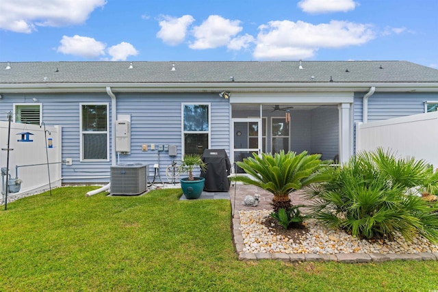 413 Goldenrod Cir Unit 2B, Little River, SC 29566 - back of house with a sunroom and a ceiling fan