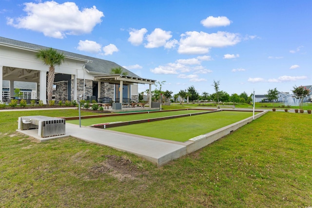 413 Goldenrod Cir Unit 2B, Little River, SC 29566 - view of community with a bocce ball area, a lawn, and a pergola