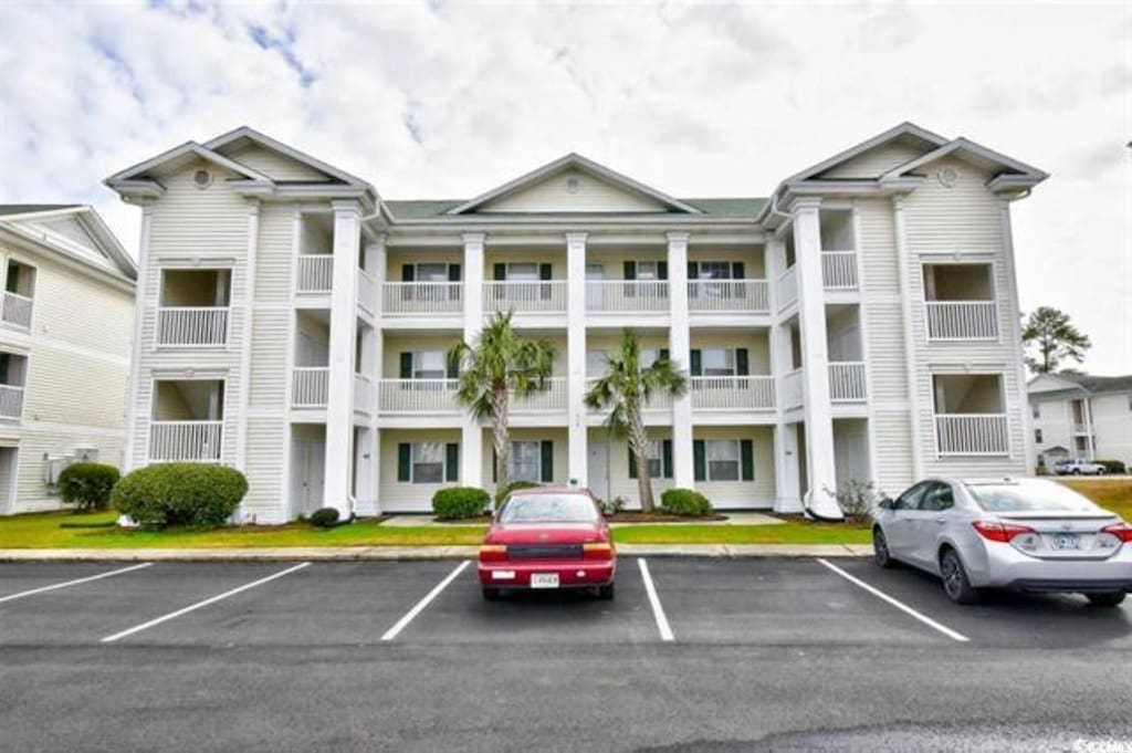 510 White River Dr Unit 24G, Myrtle Beach, SC 29579 - view of property with uncovered parking