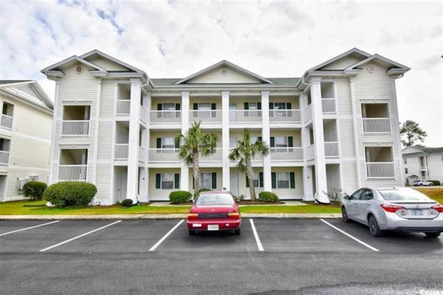 510 White River Dr Unit 24G, Myrtle Beach, SC 29579 - view of property with uncovered parking