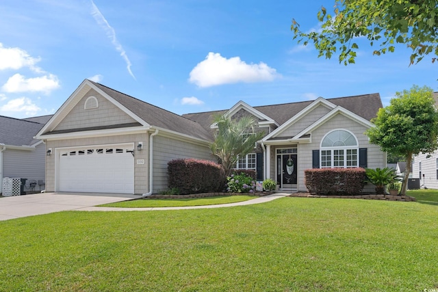 232 White Water Loop, Conway, SC 29526 - view of front of house with an attached garage, concrete driveway, a front lawn, and roof with shingles